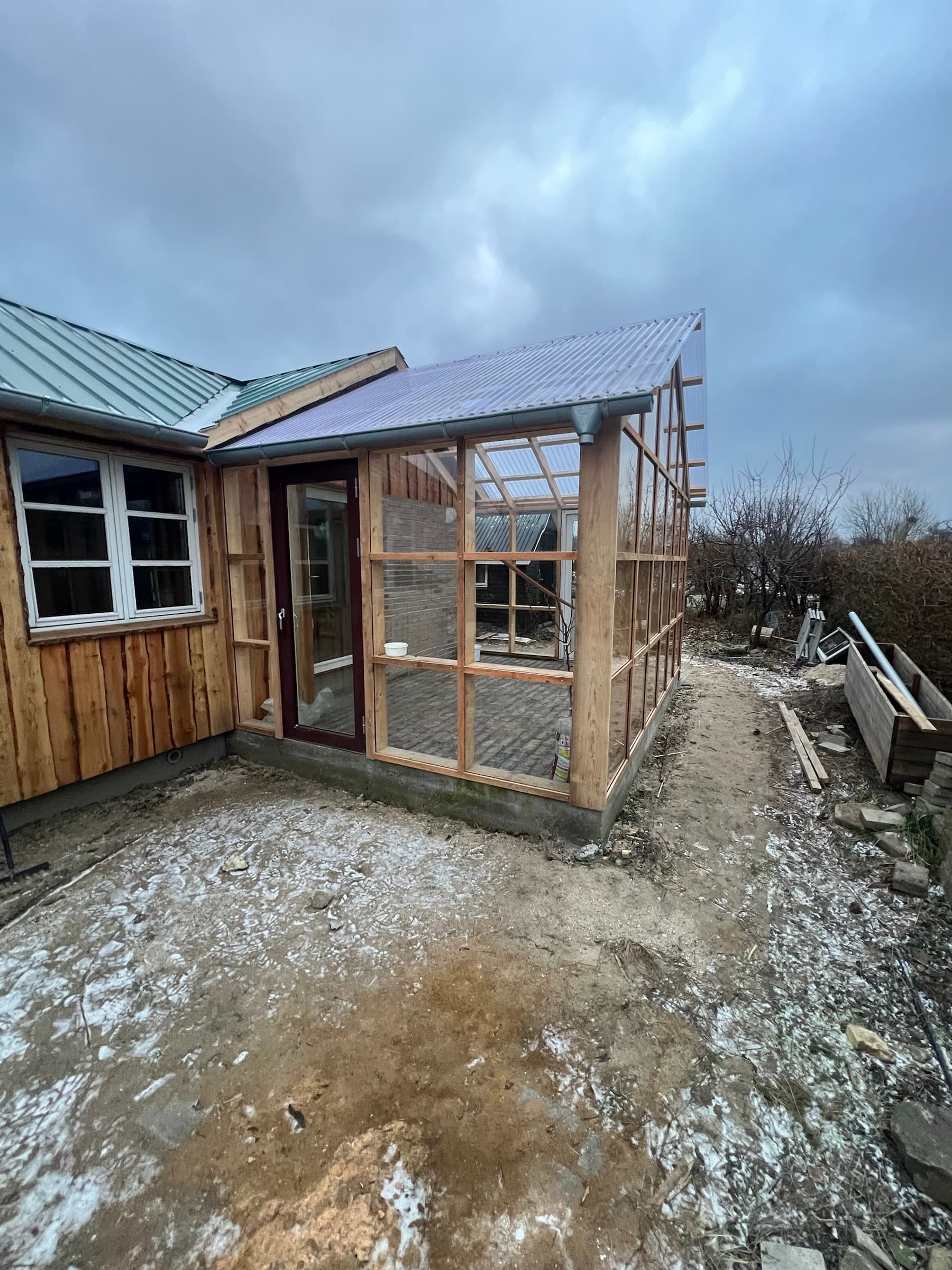 Drivhus bygget sammen med huset